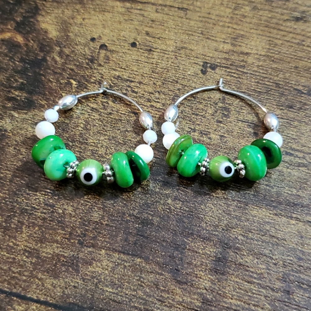 Evil eye, green white hoop earrings, good vibes